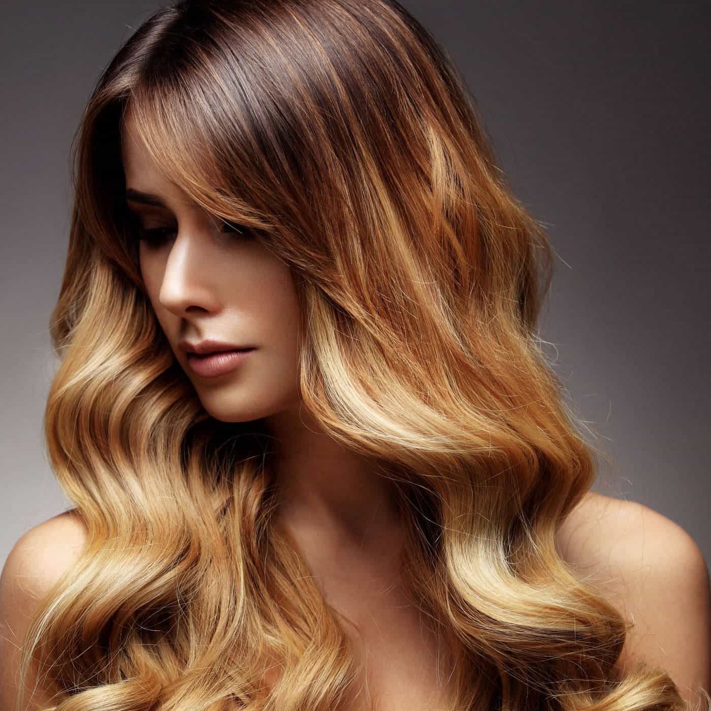 damen frisuren lang dunkelblond welle beispiel hair und style ebikon